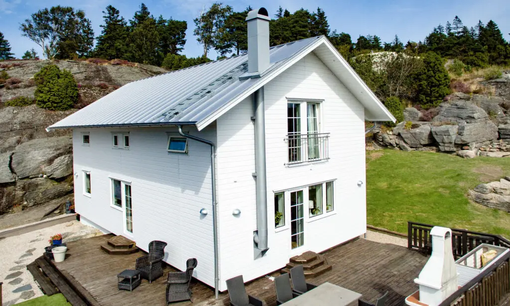 Högt hus med Exklusivpanel liggande montage