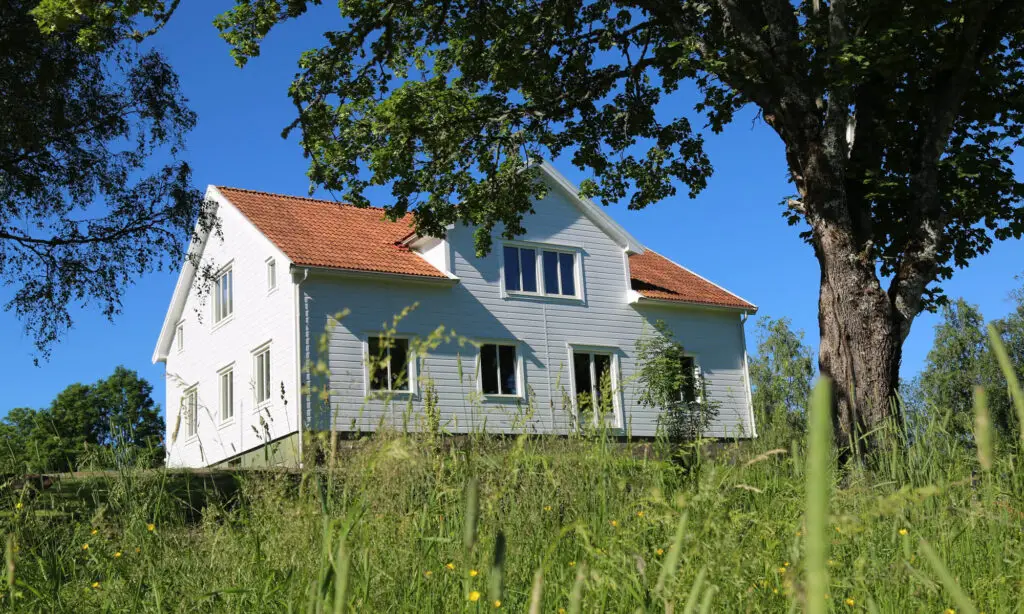 Fin gård med Västkustpanel
